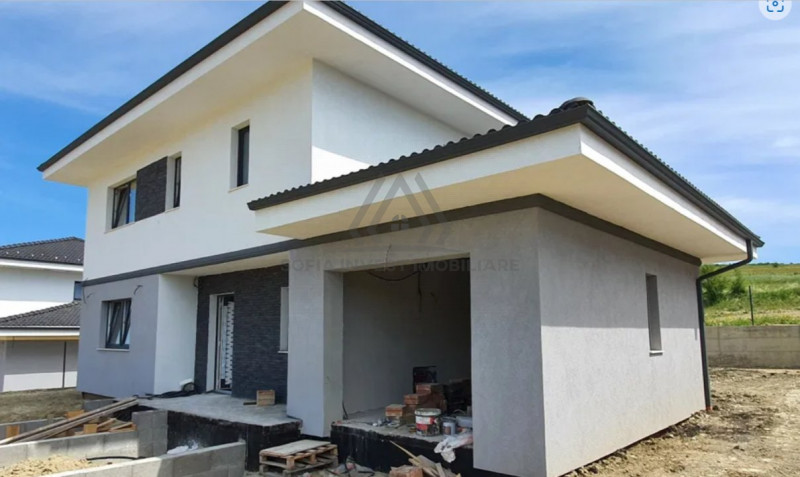 Casa moderna cu garaj in Chinteni 500mp teren