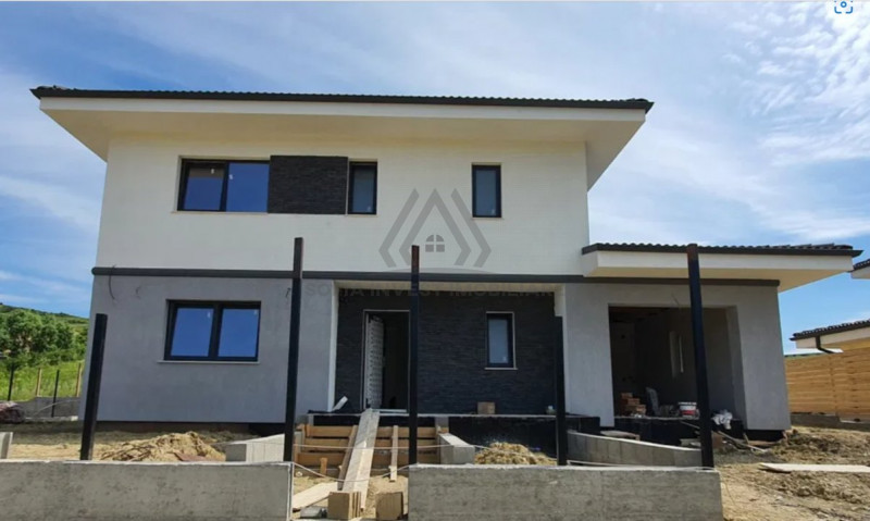 Casa moderna cu garaj in Chinteni 500mp teren