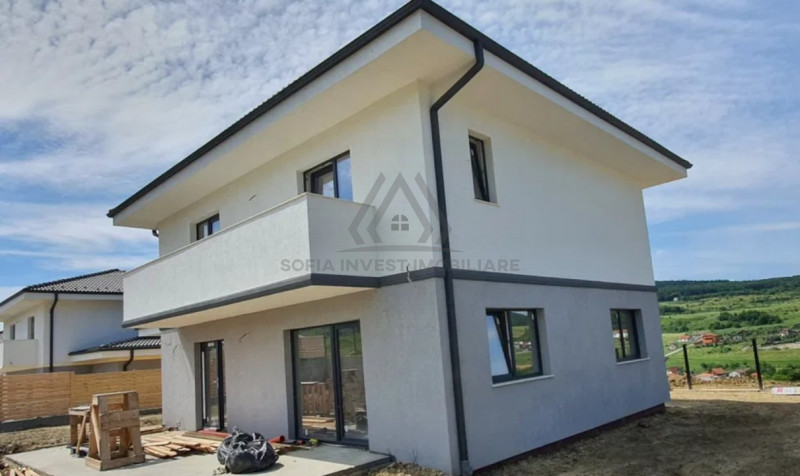 Casa moderna cu garaj in Chinteni 500mp teren